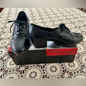 Dance shoes, tap, swing, salsa, anything! In original box. women’s size 6 M.